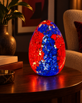LUNORA Cobalt & Ember Mosaic Lamp glowing in a warm living room