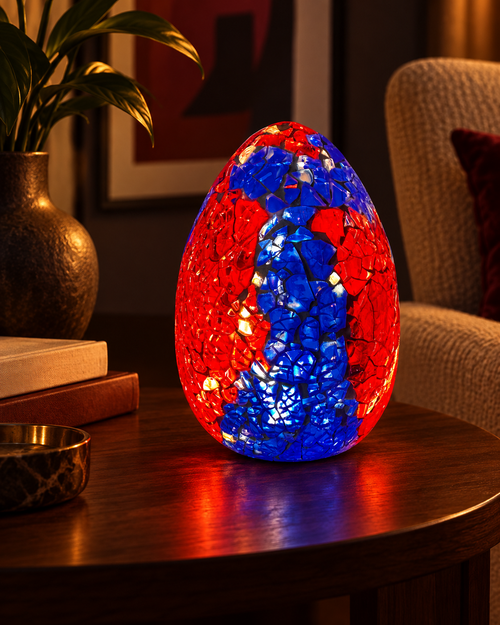 LUNORA Cobalt & Ember Mosaic Lamp glowing in a warm living room