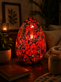 LUNORA red mosaic lamp glowing in a warm luxury interior